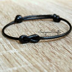 Mens Bracelet Infinity Bracelet Black Cord Bracelet Simple Bracelet Minimalist Bracelet Unisex Bracelet Vegan Cord Mens Friendship Bracelet These lovely bracelet is made with waxed cord. Easily adjustable by moving the knots closer or away. It opens from around 5'' to 10 '' inches. This bracelet will be sent in a gift pouch. Please feel free to contact me if you have any questions. For more Simple Anklets/Bracelets https://www.etsy.com/uk/shop/InsigniaCrafts?ref=seller-platform-mcnav&section_id=24106049 Thank you for visiting. InsigniaCrafts © 2018 InsigniaCrafts. All Rights Reserved. Mens Friendship Bracelet, Long Distance Relationship Bracelets, Cross Pendant Men, Relationship Bracelets, Distance Bracelets, Family Bracelets, Mens Cross Necklace, Red String Bracelet, Bracelet Minimalist