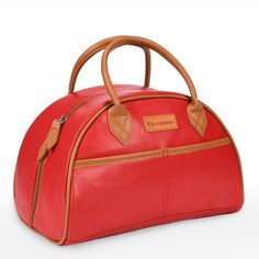 a red leather bag with brown handles