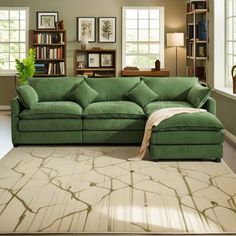 a living room with a large green couch