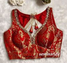 1. Fabric - Brocade.  2. Sweetheart Neck Blouse.  3. Cutsleeves Blouse. Red Brocade Blouse Designs, Bandini Blouses Designs, Fitted Blouse With Back Yoke For Wedding, Fitted Wedding Blouse With Back Yoke, Festive Wedding Blouse With Back Yoke, Festive Wedding Blouse Piece With Back Yoke, Sleeveless Blouse For Wedding And Festivals, Wedding Sleeveless Choli, Wedding Sleeveless Padded Choli