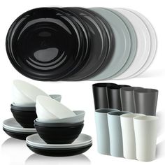 the black and white dishes are next to each other