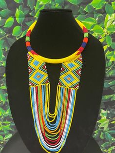 This thick necklace is made of fine multilayer beads wound together. It is very comfortable to wear and stays put around the neck. The beads are very bright and beautiful.  Contact owner for any personalization. Thanks for vising my shop and come again. Stay safe https://www.etsy.com/shop/naistumityujewelry Handmade Yellow Double Strand Necklace, Handmade Double Strand Yellow Necklace, Yellow Double Strand Beaded Necklace, Yellow Multi-strand Necklace For Gift, Double Strand Polished Bead Necklaces, Double Strand Polished Beads Necklace, Adjustable Yellow Necklace With Dangling Beads, Bohemian Multicolor Layered Necklace With Round Beads, Unique Multicolor Double Strand Necklace