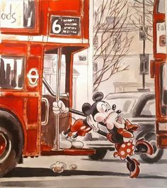 a painting of mickey mouse on the side of a bus