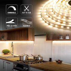 a kitchen with some lights on the wall