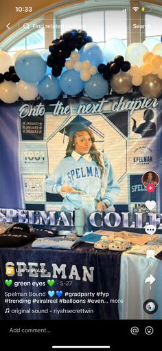 an image of a table with balloons and pictures on it for graduation day celebration at selemma college