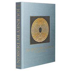 a book with an image of a golden spiral on it's cover and the title journey by design written in gold