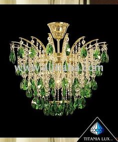 a green chandelier hanging from the ceiling