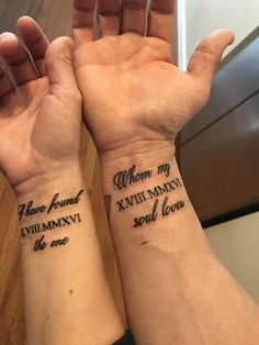 two people with matching wrist tattoos that say, i have found my evil mommy and will always the one