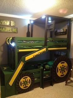 a green and yellow bunk bed in a room