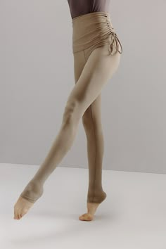 The Active Ballet Stirrup Drawstring Leggings are a great choice for getting back into your dance or exercise routine! Fit tip: if you're in between sizes, we recommend sizing up. Details Materials & Care Shipping & Returns • Features an adjustable wrap-around drawstring waistband.• Tailored from a moisture-wicking, skin-friendly Spandex blend.• Stirrup design is intended to cover the heel.• Inseam is 30" for Size M. • Materials: 69% nylon, 31% Spandex• Care instructions: For best results, hand Cool Ballet Outfits, Feminine Sportswear, Ballet Leggings, Dance Class Outfit, Ballet Inspired Fashion, Spandex Outfits, Ballet Wear, Dancer Lifestyle, Dance Leggings