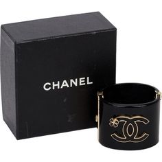 Important Chanel black lucite hinged oval cuff, CC logo with clover. Comes with original box. Designer Black Cuff Bracelet For Formal Occasions, Designer Black Cuff Bracelet For Gift, Designer Black Cuff Bracelet As Gift, Designer Cuff Bracelet For Formal Occasions, Black Chic Cuff Bracelet For Formal Occasions, Chic Black Cuff Bracelet For Formal Occasions, Chic Black Formal Cuff Bracelet, Designer Cuff Bracelet For Evening, Designer Black Enamel Bracelets