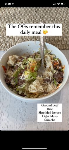 a white bowl filled with food on top of a table