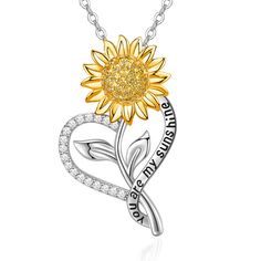 PRICES MAY VARY. ✨ 【Sunflower Necklaces for Women】This sunflower heart pendant necklace is made with 18k gold filled and S925 sterling silver base. The shape is composed of sunflower and heart, and the sunflower necklace is inlaid with 5A cubic zirconia to make it dazzling. The necklace is engraved with the words "You are my sunshine" to express your love and admiration, and use this beautiful piece to tell her how much she means to you. 🌻 【You are My Sunshine Necklace】This sunflower necklace f Flower Shaped Jewelry For Mom For Valentine's Day, Flower Shaped Jewelry For Mom On Valentine's Day, Valentine's Day Flower Shaped Jewelry Gift, Valentine's Day Flower-shaped Jewelry Gift, Personalized Flower Pendant Jewelry For Valentine's Day, Flower-shaped Jewelry For Valentine's Day Gift For Her, Valentine's Day Flower Shape Clavicle Necklace, Yellow Flower Jewelry For Mother's Day, Valentine's Day Jewelry With Flower Charm As Gift