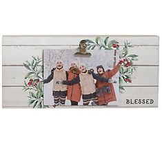 an old photo frame with three women dressed in winter clothes and holding up their hands