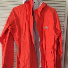 Orange North Face Jacket. Never Worn. Pink Outerwear For Fall Outdoor Activities, Pink Outerwear For Outdoor Activities In Fall, Pink Fall Outerwear For Outdoor Activities, Pink Long Sleeve Outerwear For Outdoor, Pink Raincoat For Fall Outdoor Activities, Pink Long Sleeve Raincoat For Outdoor Activities, Casual Pink Raincoat With Pockets, The North Face Outerwear For Outdoor Activities, Pink Raincoat For Outdoor Spring Activities