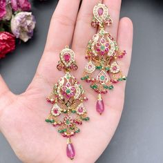 Featuring a traditional bridal jadau choker set in 22ct gold embellished with finest quality of rubies, emeralds and pearls. The choker necklace weighs 80.22 GMs including 30.82 GMs in hanging and stringing beads, The earrings weigh 23.60 GMs including 4.40 GMs in hanging beads. Price Breakup Summary Component Rupees % of Total 22k Gold 324,473 72.2% Stones & Beads 53,231 11.9% Making Charges 58,405 13.0% Taxes (GST) 13,083 3.0% Total 449,191 100.0% View Detailed Price Breakup Watch Video Here Ruby Jewelry Necklaces Gold, Jadau Choker Set, Mughal Jewellery, Choker Set Gold, Set Gold Jewelry, Jadau Choker, Gold Choker Set, Jadau Jwellery, 22k Gold Jewelry Necklaces