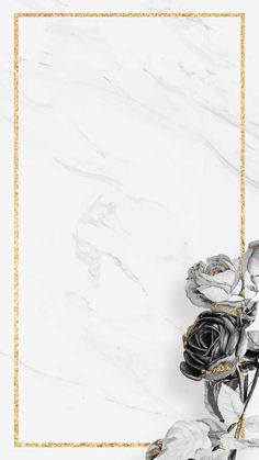 a white marble background with gold frame and black roses in the middle, on top of it