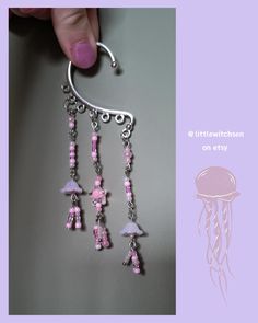 ˗ˏˋ Jellyfish Dance ear cuffs'ˎ˗ Inspired by stardew valley's Dance of the jellyfish night ~ Handmade and designed by myself, a perfect gift for you or a friend! They come with a free pair of earrings to match your magical ear piece. ᵔᴗᵔ ⊹ ࣪ ˖ Earring Care ₊⊹ Refrain from exposing to water, treat delicately. Maintain earring backs by using a dry, clean cloth for polishing (or a similar material). Do not scratch at it. If you have any questions do not hesitate to contact me! Long Ear Cuff, Ear Piece, Wrap Earrings, Bracelet Ideas, Stardew Valley, Ear Cuffs, Cuff Earrings, Earring Backs, Jellyfish