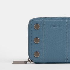 Say hello to the perfect everyday wallet - that fits inside all of your favorite styles. This compact carry-all has dedicated spaces for cards and bills, plus a secret expandable pocket that's ideal for loose keys or a chapstick. Inspired by carefully selected artworks in a gallery show, our Curated Blue leather is a true mid-tone blue, featuring subtle grey undertones. Enjoy gunmetal hardware and a touch of added thickness. Crafted with a true mid-tone blue, featuring subtle grey undertones Red cotton twill lining Gunmetal hardware, functionality covered for life Expandable pocket with magnetic snap closure Bill pocket Four credit card slots 4.5" L x .8" W x 4" H Functional Wallets With Coin Pocket For Everyday Use, Functional Everyday Wallet With Coin Pocket, Blue Wallets With Rfid Blocking For Everyday Use, Blue Wallet With Rfid Blocking For Everyday Use, Blue Trifold Wallet With Rfid Blocking For Everyday Use, Blue Trifold Wallet With Coin Pocket, Everyday Blue Trifold Wallet With Coin Pocket, Everyday Blue Wallet With Zipper Closure, Blue Trifold Wallet With Interior Card Slots