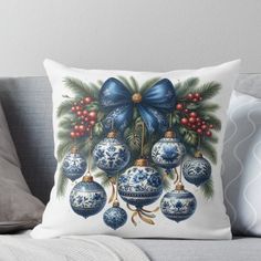 a blue and white christmas ornament throw pillow