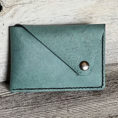 Color: Turquoise Material : Leather Approx Size: 4 X 2.5 Inches Handmade Blue Pouch Wallets, Everyday Green Coin Purse With Card Slots, Handmade Blue Wallet For Everyday Use, Handmade Blue Coin Purse For Travel, Everyday Green Coin Purse, Handmade Green Wallets For Everyday, Blue Handmade Wallet, Green Handmade Card Holder For Everyday Use, Blue Bags With Coin Pocket For Gifts