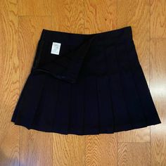 Brandy Melville Black Pleated Mini Skirt Size Small And Never Worn. Side Zipper. Cute Black Skirt #Brandymelville #Blackskirts #Johngalt #Preppy #Boho #Preppyskirts #Pleatedskirt #Miniskirts #Brandy #Urban Fitted Mini Skirt For School Uniform, Black Mini Skort For School, Black Mini Skirt For School, Black Mini Skirt For School Uniform, Black Pleated School Uniform Mini Skirt, Black Lined Pleated Skirt For School, Classic Black Fitted Pleated Skirt, Black Pleated Mini Skirt For School Uniform, Black Short Skirt For School