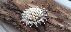 A beautiful vintage white brooch with beautiful detailing and pearls. A wonderful artifact for a gift. Please pay attention The brooch has been used, it was bought at a flea market and has signs of wear, the decoration is not new, but it is in very good condition and wearable. Weight 20 grams Welcome to my store. Here you can find interesting collectibles of different periods and trends such as ancient artifacts, crosses, pendants, buckles, rings, arrowheads, coins, personal belongings of the First and Second World Wars, and much more. All my products are 100% original because the majority of them were found by me personally with the help of a metal detector. DELIVERY: At the expense of delivery, I send my goods mainly the day after you bought them in my store, The average delivery time is Formal White Pearl Brooches, White Pearl Brooches For Formal Occasions, Vintage White Wedding Brooches, Victorian White Wedding Brooches, World Wars, Personal Belongings, Metal Detector, Ancient Artifacts, Second World