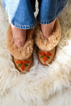 Beautiful, unique, traditional, 100% handmade sheepskin moccasins slippers are made from natural leather and sheep wool. Small leather pieces and sheepskin leftovers are turned into beautiful and one of a kind home shoes. Our slippers are very soft and comfortable. Perfect on rheumatic pain and are hypoallergenic. Outer: sheepskin; Sole: harden suede leather ( will soften after 2-3 days) Insole: wool lining Please note - because of handmade nature of this slippers colour shade, or thread might d Suede Closed Toe Slippers For Fall, Comfortable Closed Toe Fall Moccasins, Handmade Natural Slippers With Round Toe, Artisan Handmade Slippers With Round Toe, Luxury Moccasins With Stitched Sole, Artisan Handmade Round Toe Slippers, Brown Sheepskin Slippers For Fall, Handmade Brown Closed Toe Slippers, Sheepskin Slippers With Leather Sole And Round Toe