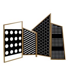 three black and white panels with dots on them, one in the shape of a house