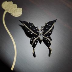 Transform Any Of Your Outfit Into A Complete Masterpiece With This Versatile Butterfly Brooch. Handcrafted Sophisticated And Delicate Finish Amazingly Detailed With Rhinestones Secured Stainless Steel Pin-Back Dimensions: 4.6 X 4.6cm Can Be Used To Dress Up A Casual Attire Or Accentuating A Formal Dress. *Notes: These Brooches Are Not Intended To Be Used As Load-Bearing Fastenings. #1286a Black Brooch Pins For Evening, Chic Black Brooches For Parties, Chic Black Party Brooches, Butterfly Shaped Brooches For Party, Elegant Butterfly Shaped Pins, Chic Black Brooch As A Gift, Chic Black Brooches For Gifts, Chic Black Brooch For Gift, Black Brooch Pins For Party