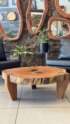 a wooden table sitting on top of a tiled floor