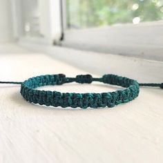 Handwoven W/ Teal Blue Waxed Polyester Thread In A Macrame Square-Knot Pattern. This Bracelet Is Sturdy & Water-Proof, Perfect For Wearing All Day, Everyday & For Layering With Other Bracelets! Finished W/ A Secure Sliding Knot. : Adjustable Knot! (Fits 5 In. To 8.5 In. Wrist) #: Handmade Bracelet Boho Romantic Goth Fairy Grunge Jewelry Gypsy Stackable Bracelet Dainty Minimalist 90s Y2k 2000s Vintage Retro Jewelry Surfer Beach Coconut Girl Granola Girl Jewelry Bracelet Friendship Gift Cutecore K Casual Blue Macrame Bracelets, Casual Blue Macrame Braided Bracelets, Casual Everyday Macrame Jewelry, Casual Macrame Jewelry With Nylon Cord, Casual Braided Bracelets With Macrame In Nylon Cord, Casual Macrame Braided Bracelets In Nylon Cord, Casual Macrame Braided Bracelet With Nylon Cord, Casual Green Macrame Bracelets, Casual Green Macrame Bracelet