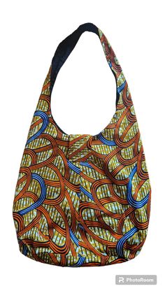 Hobo Bag - Blue or Orange African Print Bag *HOW I CREATED THIS BAG: Our aim is to bring you eco-friendly shopping bags that can be used again and again. This bag is made with genuine African Print 100% cotton fabric. The bag is expertly sewn together making this bag strong and sturdy.  This tote bag is lightweight but also sturdy enough to carry books or shopping.  When the bag is not in use it can be easily rolled up  Features: *Made of 100% African Print cotton *Sustainable, renewable and bio Blue Reversible Shoulder Bag With Double Handle, Reversible Blue Shoulder Bag With Double Handle, Blue Reversible Tote Shoulder Bag, Reversible Blue Tote Shoulder Bag, Reversible Blue Shoulder Bag For Shopping, Blue Reversible Shoulder Bag For Daily Use, Reversible Bucket Bag For Shopping, Blue Reversible Rectangular Bag, Blue Square Reversible Bag