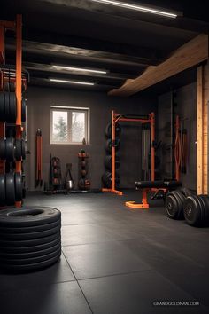 an empty gym with black and orange equipment