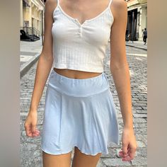 Stretchy, Mini Skirt With A Thick Waistband And Ruffle Hem. Fabrics: 96% Cotton , 4% Elastane Measurements: 13" (33 Cm) Rise, 11.5" (32 Cm) Inseam, 19" (57 Cm) Waist Made In: Italy Brandy Melville Outfits Skirt, Trendy Blue Mid-rise Mini Skirt, Malia Denim Skirt Brandy, Light Wash Mid-rise Cotton Mini Skirt, Mid-rise Denim Blue Mini Skirt, Malia Mini Skirt Brandy, Red Denim Skirt, Cara Skirt, Brandy Melville Plaid Skirt