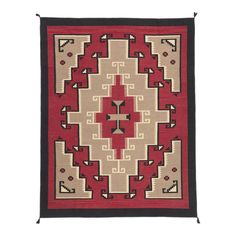 a red and beige rug with black trimmings on the bottom, featuring an intricate design