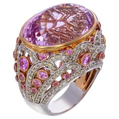 Zorab Creation Masterpiece of Elegance: The 35.15-Carat Oval Kunzite Ring Luxury Iridescent Cabochon Rings, Luxury Oval Kunzite Jewelry, Fantasy Jewelry Magic, Shades Of Light Pink, Bridgerton Dresses, Vintage Cocktail Rings, Kunzite Ring, Ring Aesthetic, Soul Contract