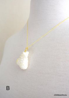 This one of a kind (OOAK) white coral pendant is suspended on a 18 inch 14kt gold-filled 0.9mm cable chain.  The coral is natural and organic in its beauty with so many fine details that will enchant you.  This delicate, luxurious necklace is perfect for an elegant evening out.  Pendant AHeight including bail: 1.47 inches or 37.4mmWidth (at widest point): ~1.17 inches or 29.7mmThickness: 0.5 inches or 13.3mmPendant BHeight including bail: 1.54 inches or 39.2mmWidth (at widest point): 0.94 inches 35th Wedding Anniversary, Coral Pendant, White Coral, Coral And Gold, Coral Jewelry, Skull Earrings, Keep Jewelry, Jewelry Care, Mens Gifts