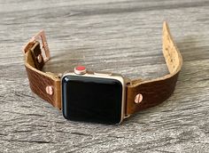 High Quality Italian Brown Grain Leather Bracelet. Designed And Handmade by Simeon D Jewelry Studio. Adjustable Size Bracelet Perfectly Tailored for Your Wrist. This Bracelet Fits ALL Apple Watch Series. Not For Other Models. Apple Watch Is NOT Included. Please Measure Your Wrist Before Submitting Your Order! Follow my Studio on Social Media for Updates & New Designs. Create Your Own Unique Style! Be Different! Be Unique! Make a Fashion Statement Every Place You Go! Get Tons of Compliments W Adjustable Brown Apple Watch Band For Gift, Adjustable Brown Apple Watch Band As Gift, Adjustable Brown Apple Watch Band, Brown Adjustable Apple Watch Band, Adjustable Rectangular Apple Watch Band, Modern Brown Apple Watch Band As Gift, Brown Rectangular Apple Watch Band Gift, Rectangular Apple Watch Band Gift With Wrist Strap, Everyday Rectangular Bracelet Watch Band