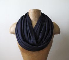 This Midnight Blue Infinity Scarf comes in a lightweight waffle knit that breaths easy for all day wear. Sewn with a double layer and finished with a perfectly clean (and invisible) blind stitch.  The Details: - Length - approximately 64" round - Width - approximately 13"  - Color - Midnight Blue  - Material - Waffle knit - Hand wash cold, hang dry Please Note:  Color accuracy is very important to me. While what's displayed on my screen accurately matches the fabric, colors may vary slightly due Cleaning Blinds, Blind Stitch, Loop Scarf, Knit Infinity Scarf, Circle Scarf, Lightweight Sweater, Sweater Knit, Light Weight Sweater, Waffle Knit