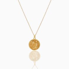 Aquarius Zodiac Coin Pendant - Classic. Crafted for you to flaunt your star sign, this necklace goes with every outfit and will give a hint of sentiment wrapped in luxury to your style. The Diamond Bezel around the Gold Coin blends into a delicate yet beautifully detailed piece. Coins 5. 4 grams of 18k yellow gold and 0. 44 ct natural diamonds Fine Jewelry Zodiac Sign Necklace As Gift, Luxury Gold Plated Zodiac Necklaces, Gold Zodiac Sign Fine Jewelry Necklace, Celestial Zodiac Sign 14k Gold Necklaces, 14k Gold Celestial Zodiac Necklaces, Fine Jewelry Zodiac Sign Necklace For Gift, Luxury Zodiac Sign Necklaces, Zodiac Sign Fine Jewelry Necklace Gift, Zodiac Sign Medallion Amulet Necklace