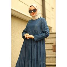 Tiered Long Maxi Dress - Modestly Designed. Casual Maxi Dress For Layering, Casual Cotton Tiered Maxi Dress, Casual Cotton Maxi Tiered Dress, Casual Blue Tiered Dress, Casual Long Sleeve Tiered Summer Dress, Casual Blue Maxi Length Tiered Dress, Casual Long Sleeve Flowy Tiered Dress, Blue Casual Flowy Tiered Dress, Casual Blue Flowy Tiered Dress