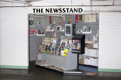 the news stand is full of books and magazines