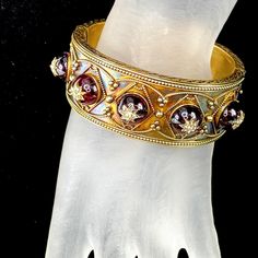 Victorian 15k Gold Garnet Carbuncle Diamond Bangle Bracelet Era: Victorian, Of English Origin Composition: 15k Yellow Gold Primary Stone: Garnets Carbuncles Stone Carat: 10 Ctw (2.0 Ct Each) Secondary Stone: Rose & Old Mine Cut Diamond Stone Carat: 0.5ct (Forty-Five Stones) Bracelet Length: 6.5" Circumference, 2 1/4" Wide. Bracelet Width: 1.00" Bracelet Weight: 46.7 Grams (30.1 Dwt) Bracelet Condition: Acid Test Indicates 14k Gold, Xrf 150k. Two Garnets Have A Fine Hairline Crack , The Base Of B Luxury Jeweled Yellow Gold Bracelets, Yellow Gold Jeweled Bracelet For Formal Occasions, Yellow Gold Jeweled Bracelets For Formal Occasions, Jeweled Yellow Gold Bracelets For Formal Occasions, Formal Yellow Gold Jeweled Bracelets, Diamond Bangle Bracelet, Old Mine Cut Diamond, Stone Rose, Diamond Bangles Bracelet