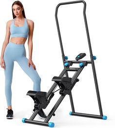 a woman standing next to an exercise machine