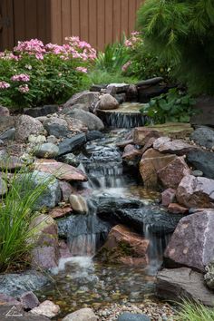 there is a small waterfall in the garden