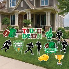 football yard decorations on the lawn in front of a house