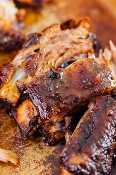 ribs and onions on a wooden cutting board