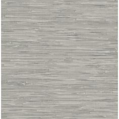 an area rug with grey and white stripes