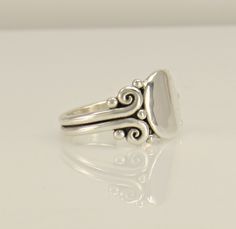 R1322- Sterling Silver Engravable Ring, Size 10 . I can size it to fit, just contact me. No charge to size down, contact me for sizing up. Sorry I do not engrave, but a lot of Jewelers have the capability. The top of the ring measures 14 mm and the band is 2 mm. This ring is made by the Lost wax Casting method, were I make the design in wax and then cast it into silver. To learn more about Me and the Lost Wax Method please visit my website at www.denimanddiamondsjewelry.com Thanks for visiting, Unique Adjustable Signet Ring With Polished Finish, Anniversary Artisan Signet Ring With Polished Finish, Unique Hand Forged Signet Ring For Anniversary, Classic Adjustable Hand Forged Rings, Unique Wedding Signet Ring Stamped 925, Artisan Oval Engraved Ring For Anniversary, Artisan Engraved Oval Ring For Anniversary, Artisan Rings, Wax Casting